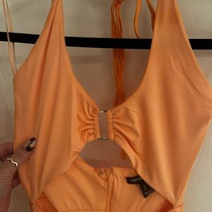 Orange bodycon halter dress